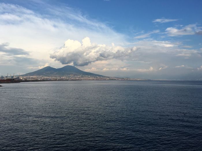 Scenic view of gulf of naples against sky