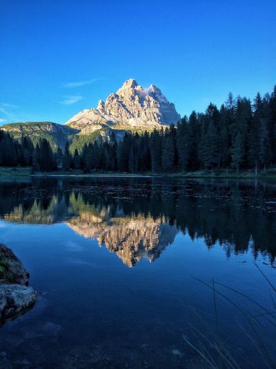 Scenic view of mountain reflection in lago d antorno