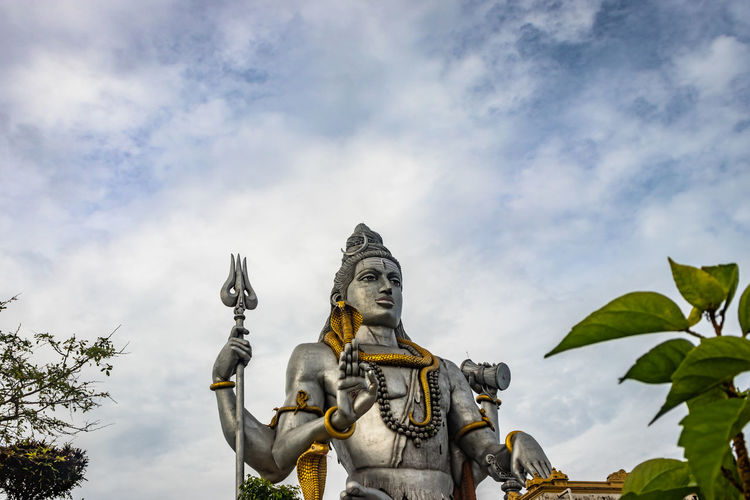 Shiva statue isolated at murdeshwar temple close up shots from low angle