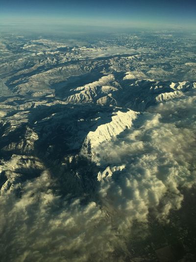 Aerial view of cloudscape over landscape