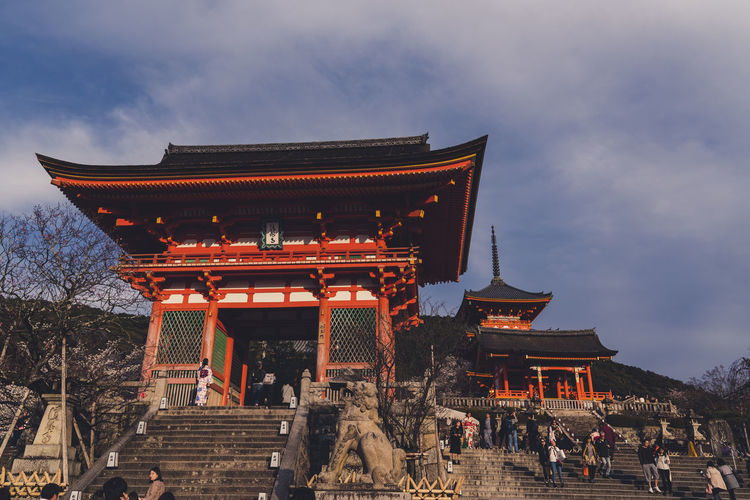 Group of people in temple against building