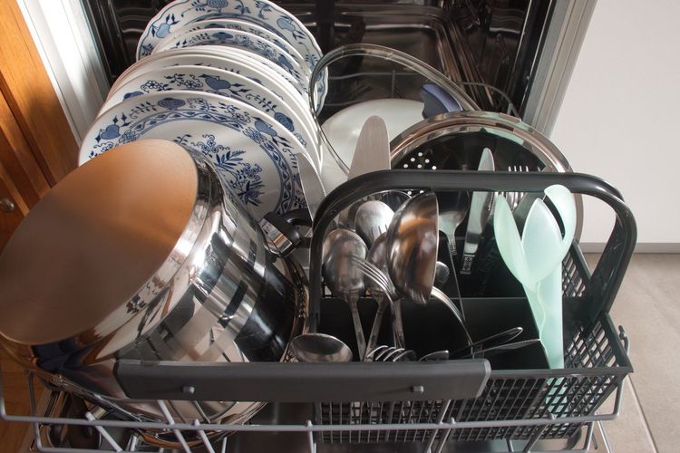 Close-up of dishes in dishwasher