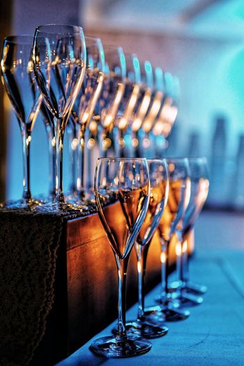 Wine glasses arranged on table