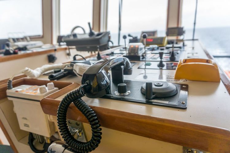 Close-up of telephone on desk in office