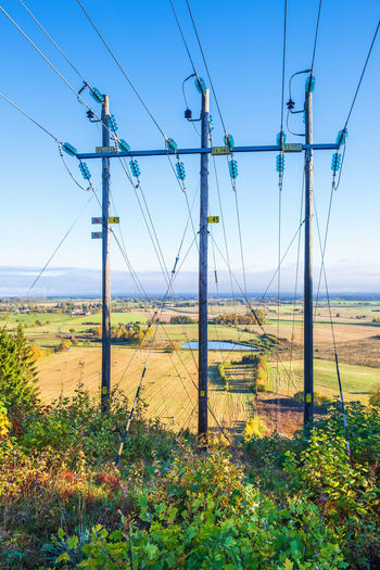 Powerline with a aerial view over the landscape at autumn