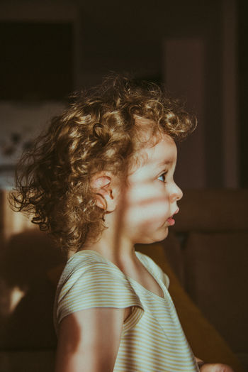 Portrait view of curly little girl