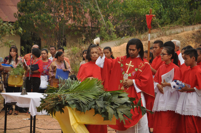 Teenage girl playing in traditional clothing