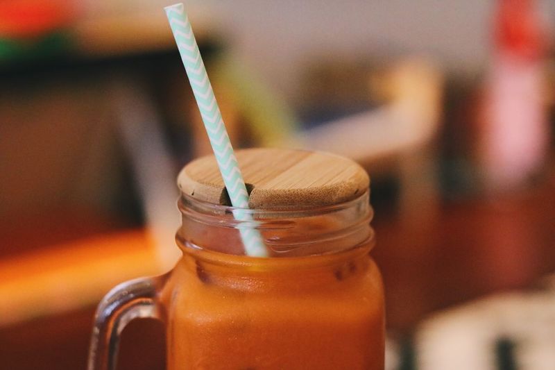 Close-up of drink in jar on table