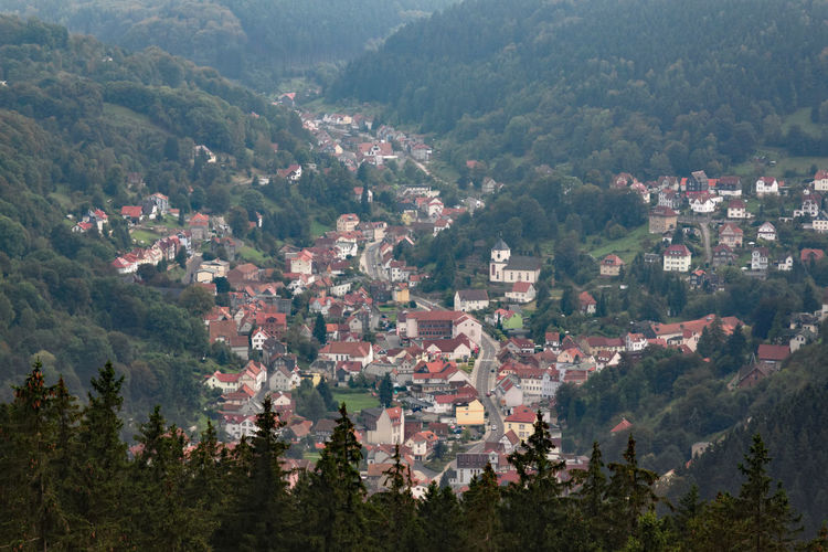 High angle view of townscape and mountains