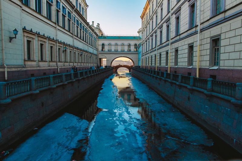 View of canal along buildings
