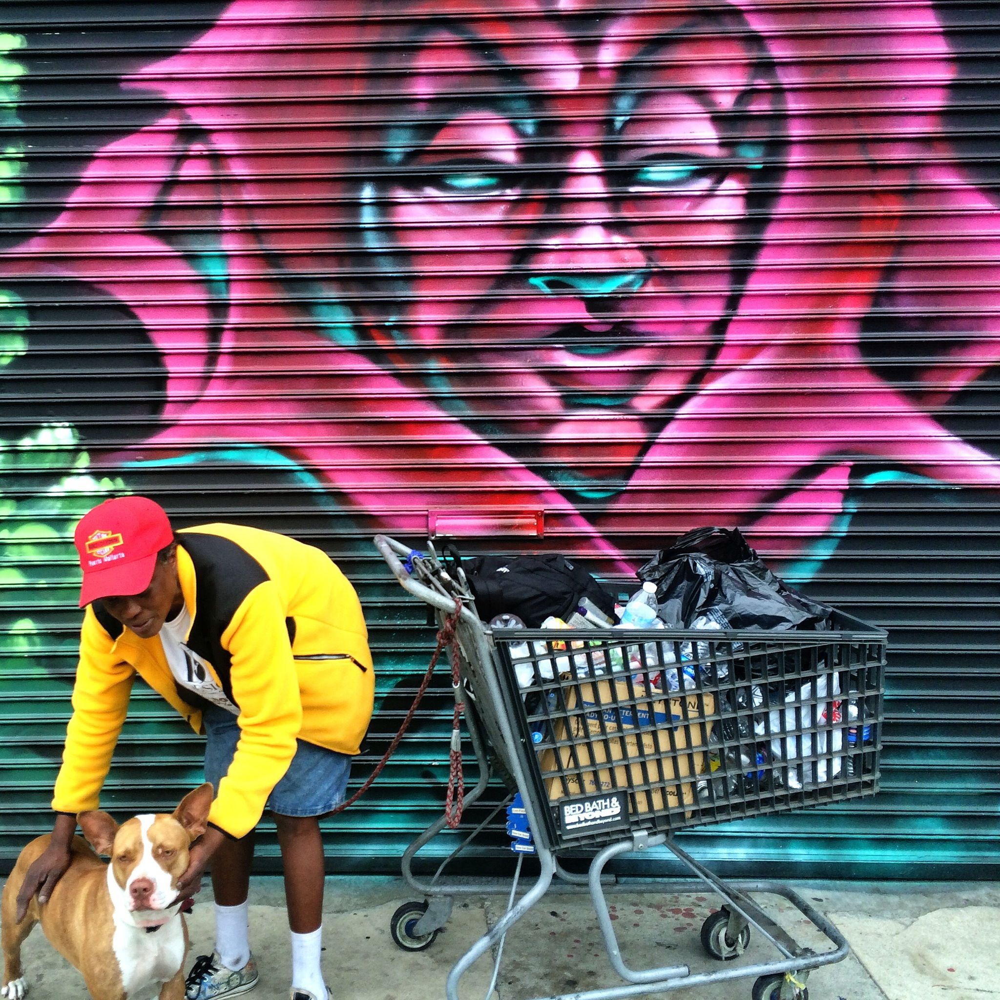 multi colored, men, lifestyles, leisure activity, graffiti, wall - building feature, art and craft, creativity, casual clothing, built structure, street, day, colorful, architecture, clothing, art, outdoors, transportation