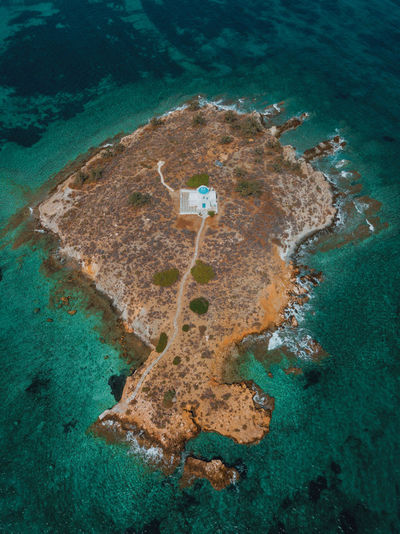 Aerial view of lighthouse on island
