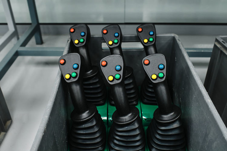 Lever-shaped plastic objects placed inside a box
