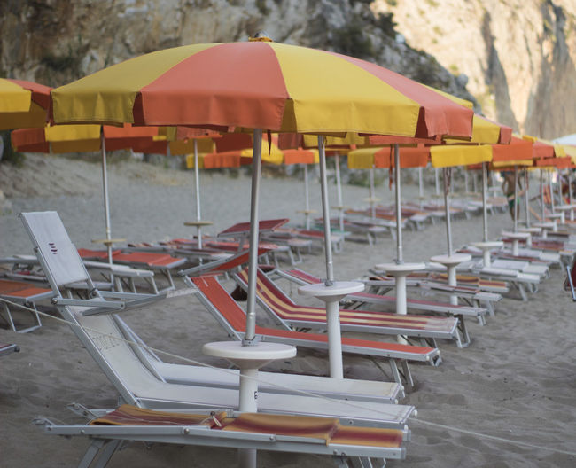 Chairs and parasols on beach