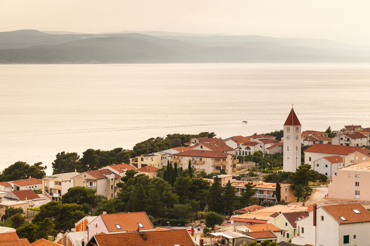 High angle view of townscape by buildings in city, baška voda, croatia
