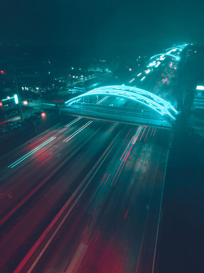 High angle view of light trails on multiple lane highway