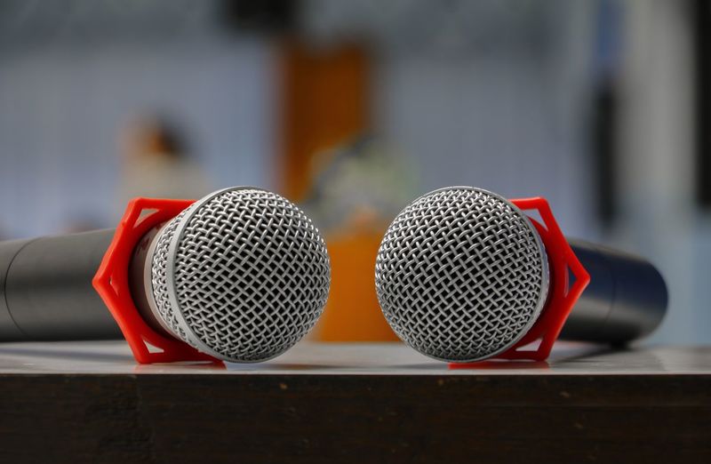Close-up of microphones on table