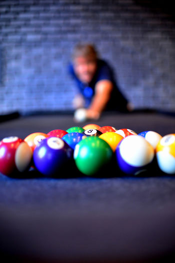Multi colored balls on table