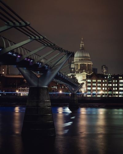 London millennium footbridge over thames river against st paul cathedral