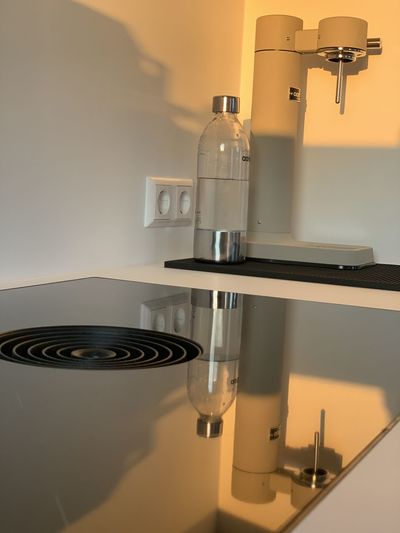 Close-up of wine glass on table at home