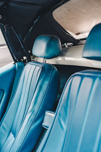 Blue front seats of a classic american sportscar