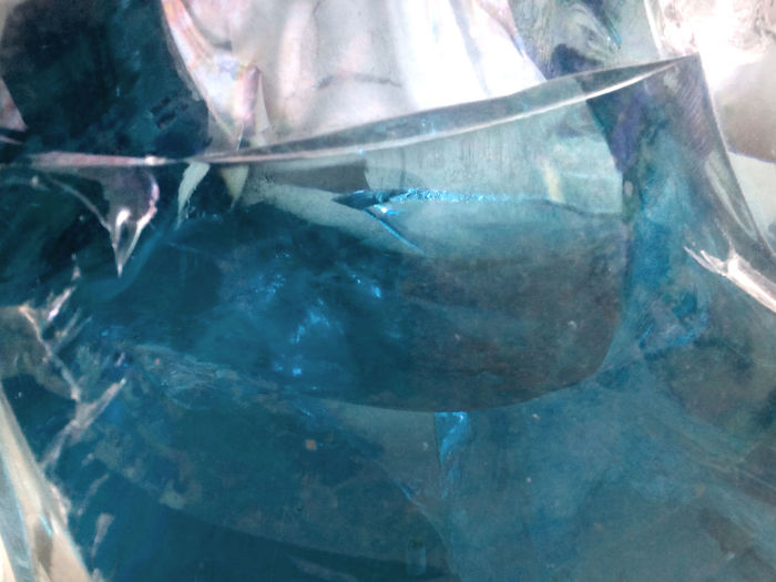Close-up of water against blue sky