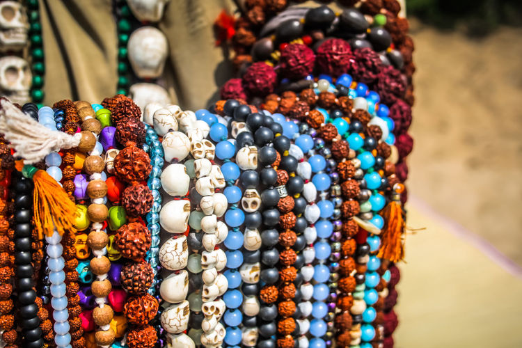 Close-up of multi colored jewelry for sale