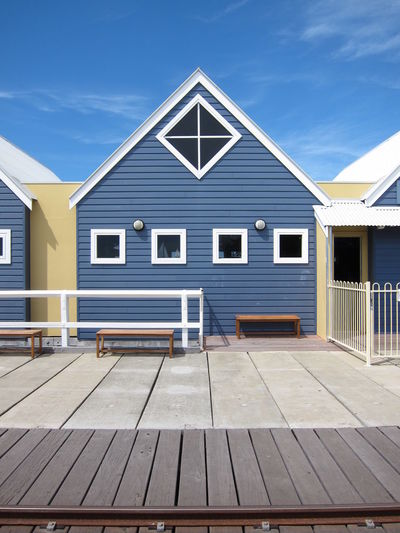 Huts at busselton jetty against sky