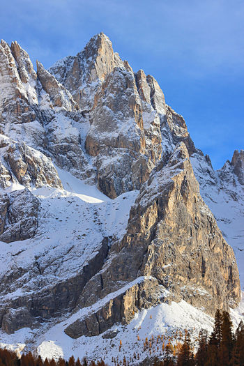  pale di san martino. unesco italy. scenic view of snowcapped dolomites against clear blue sky.