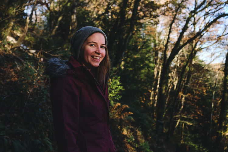 Portrait of a smiling young woman in winter