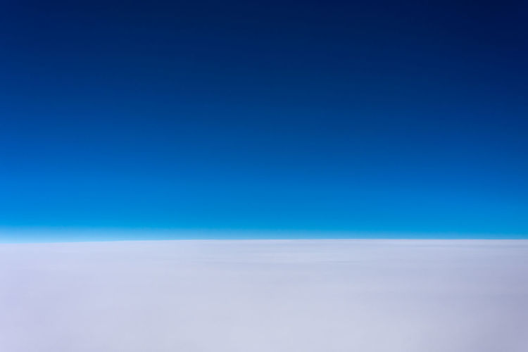Scenic view of cloudscape against clear blue sky