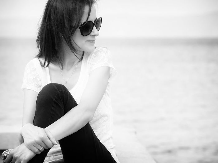 Woman wearing sunglasses at beach