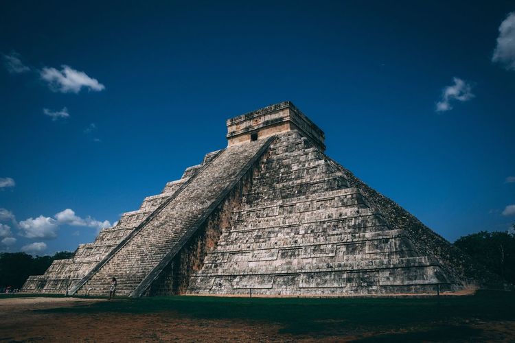 Exterior of chichen itza against blue sky
