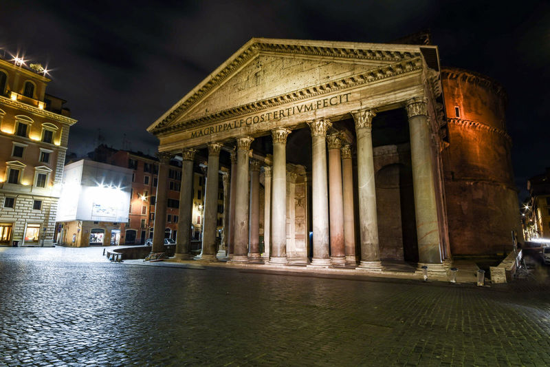 Low angle view of illuminated building at night