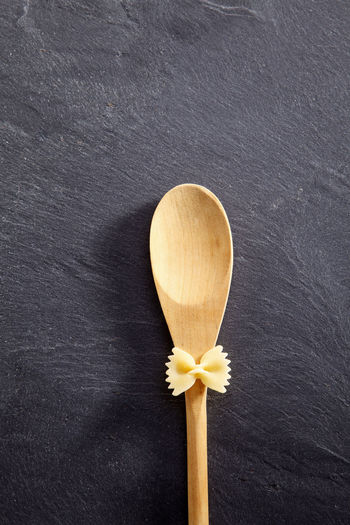 Directly above shot of farfalle pasta on spoon