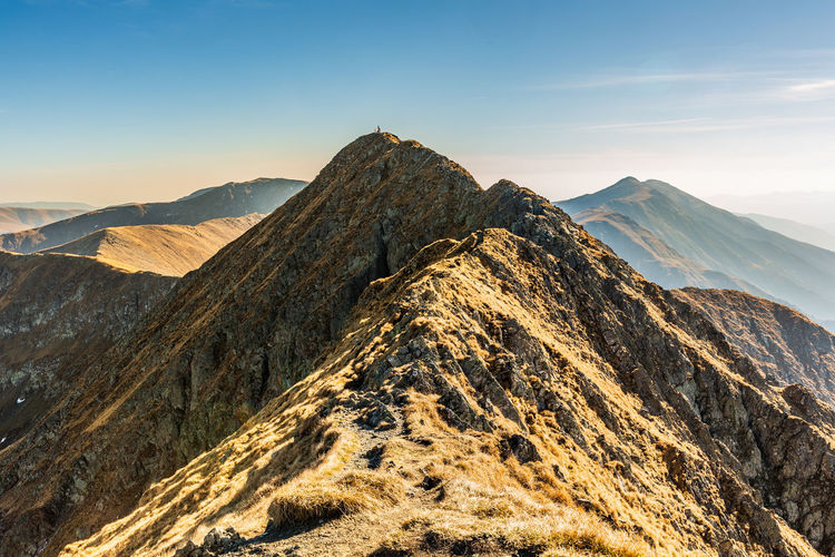Scenic view of mountain range against sky