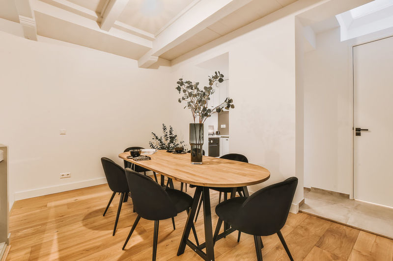 Empty chairs and tables on floor at home