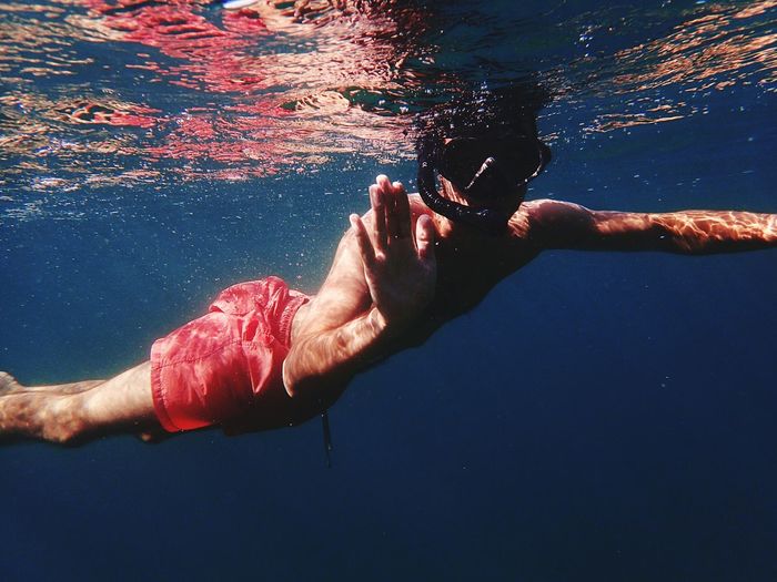 Man swimming in sea