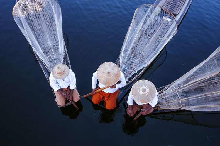 High angle view of fishermen in lake