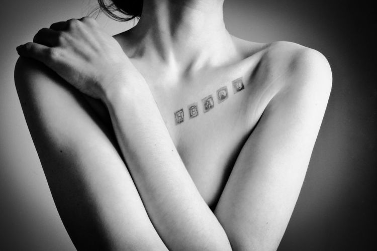 Midsection of woman with text