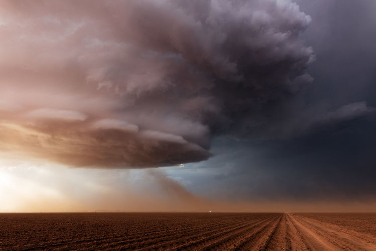 Dramatic supercell storm clouds over a field near lubbock, texas
