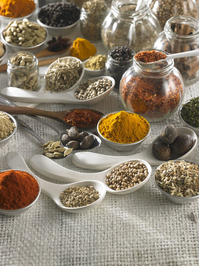 Close-up of various spices on burlap