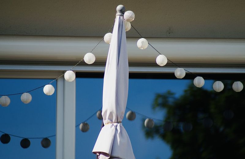 Low angle view of umbrella in the city
