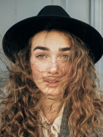 Portrait of woman wearing hat