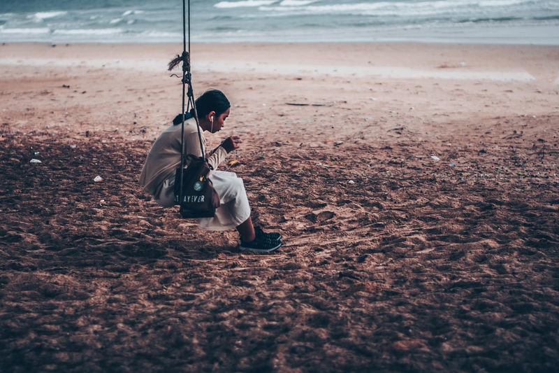 Man playing on beach