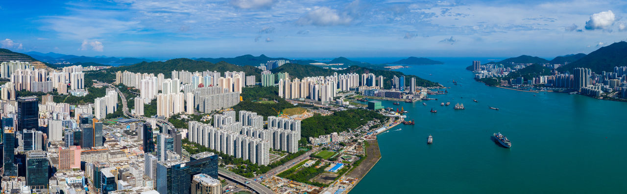 Aerial view of cityscape by bay