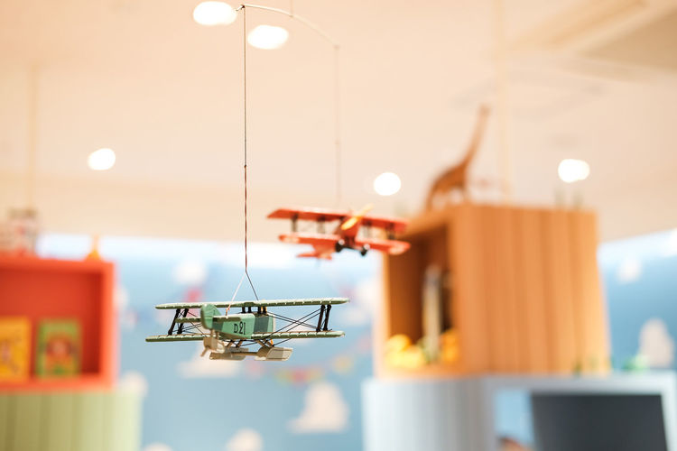 Close-up of toy hanging on clothesline