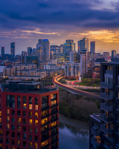 High angle view of buildings against sky during sunset