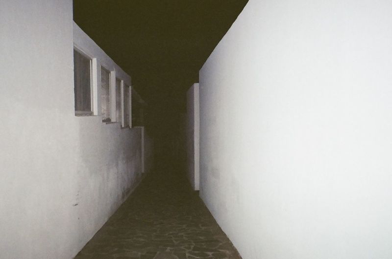 Narrow corridor along walls