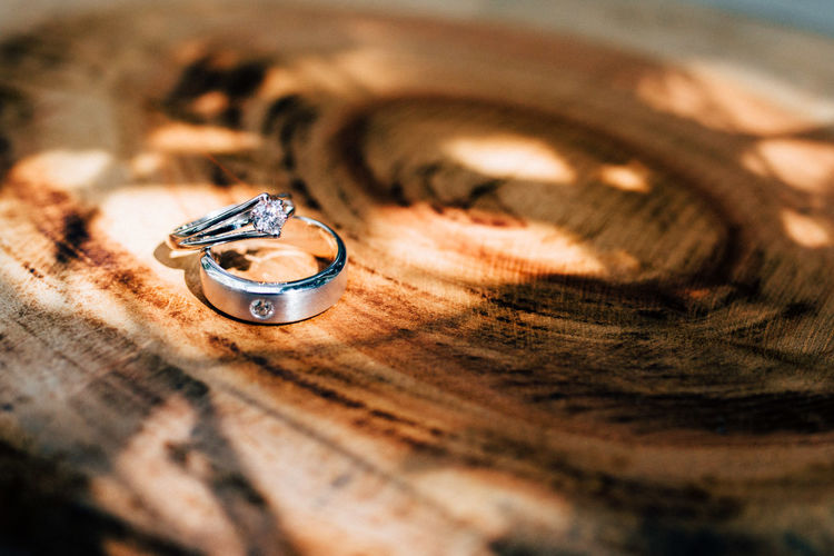 Close-up of finger ring on wooden table